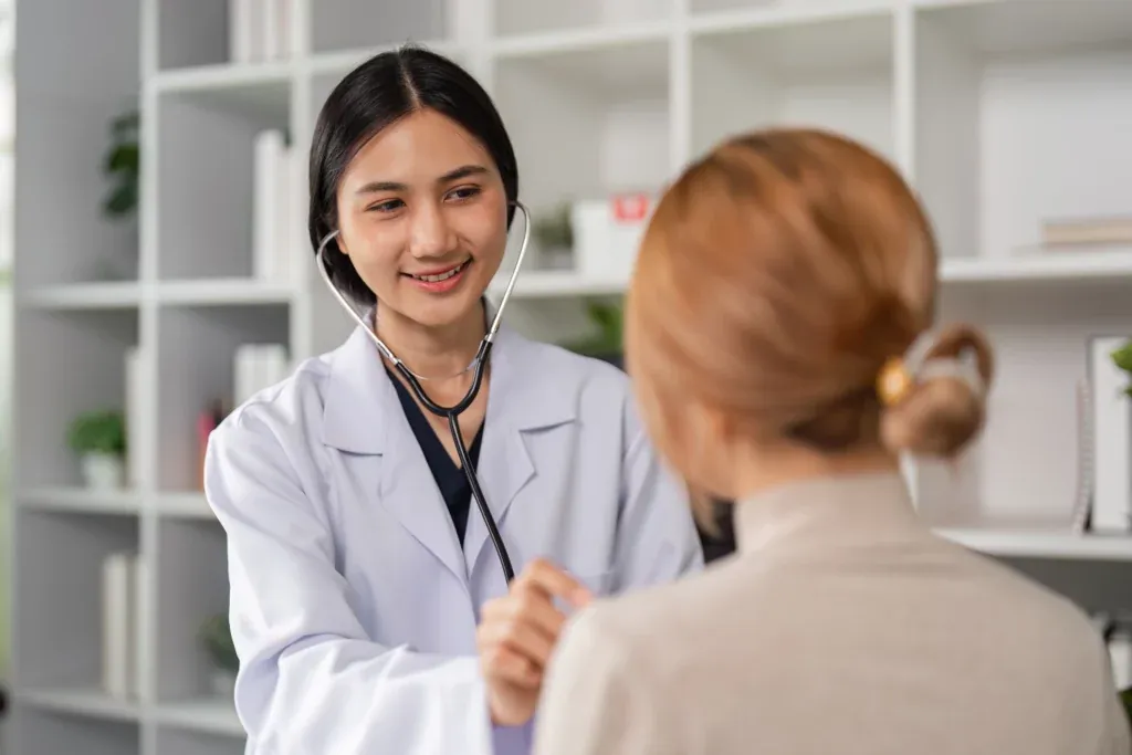 A doctor talking with a patient