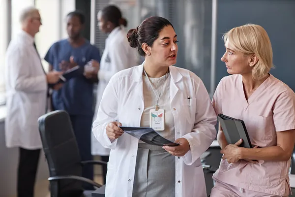 Two colleagues talking after a shift