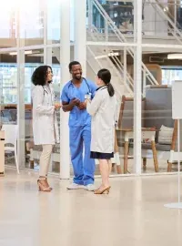 Doctors and nurses talking in the practice